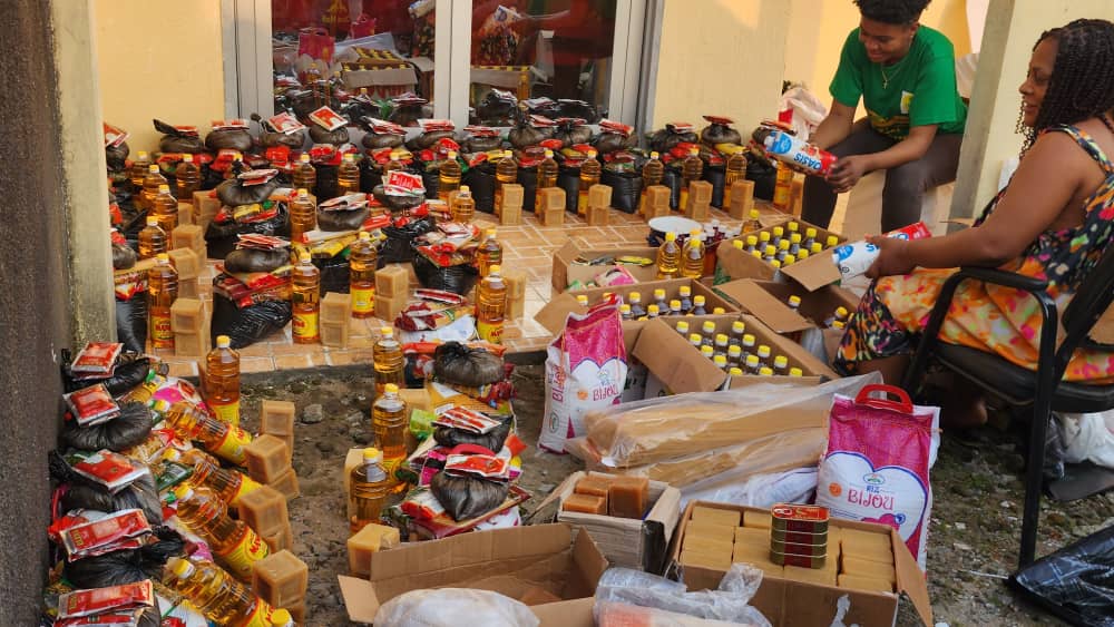 Cooking oil and dry goods being sorted by the Ark volunteer team